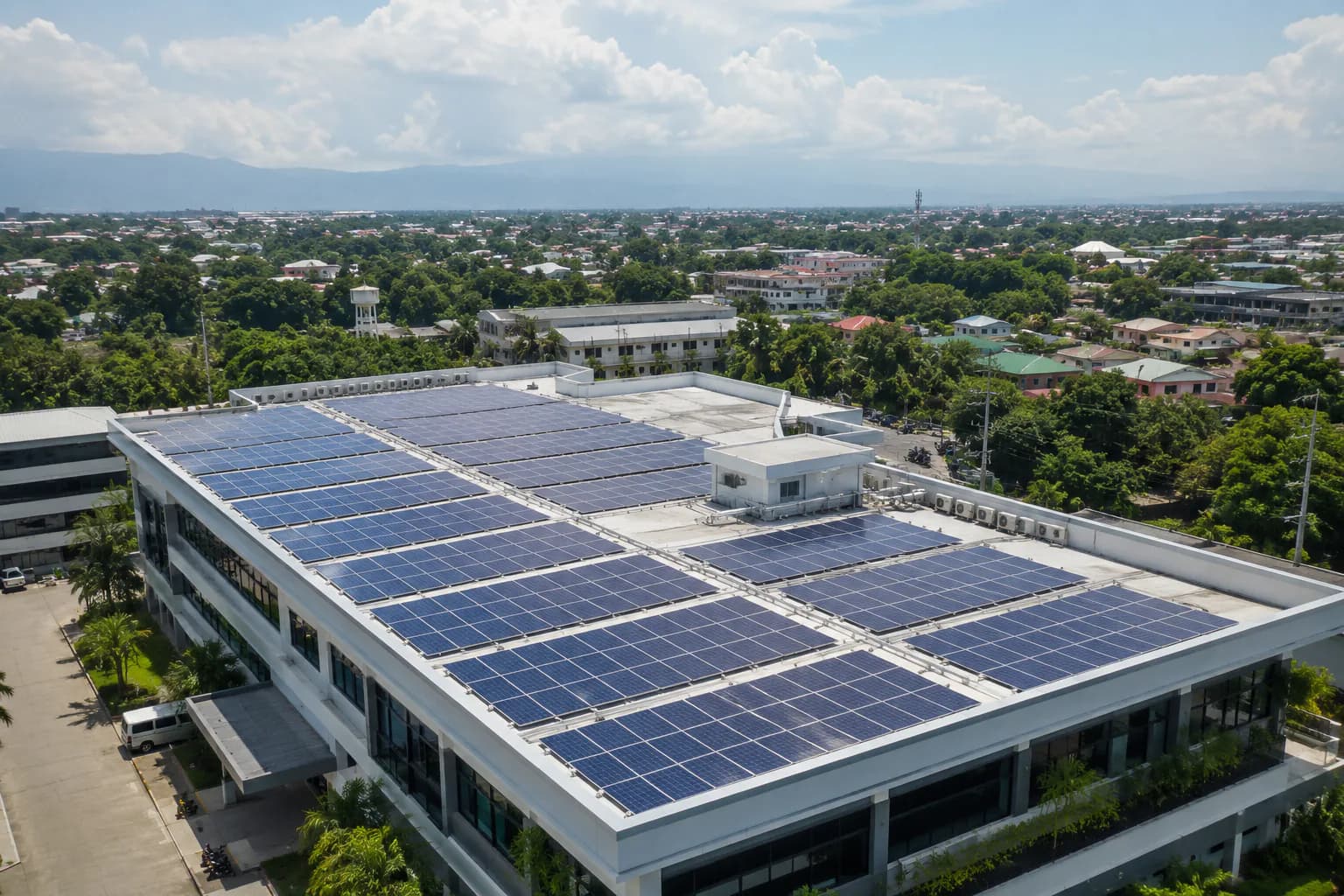 Commercial building in the Philippines with a large rooftop solar installation